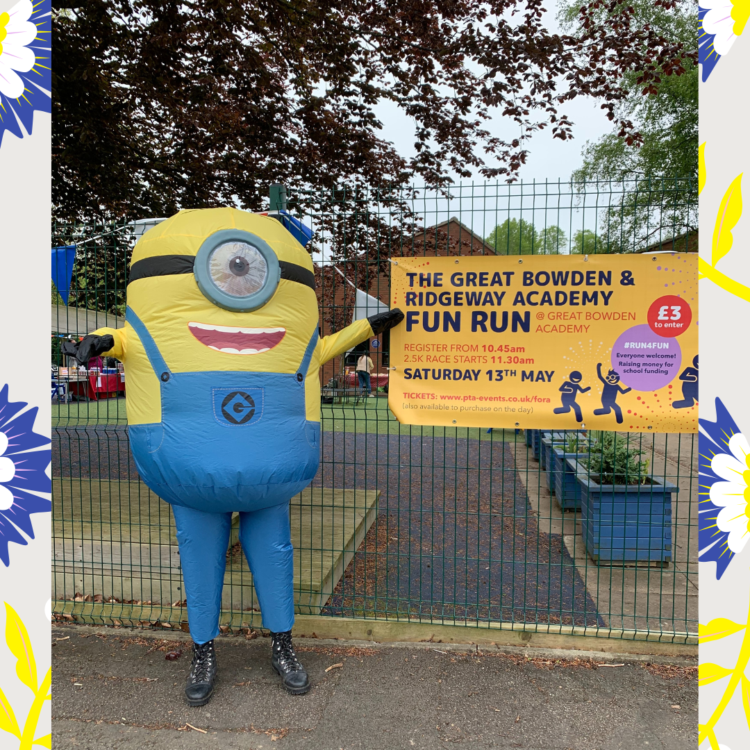 A minion next to a Fun Run banner outside Great Bowden Academy